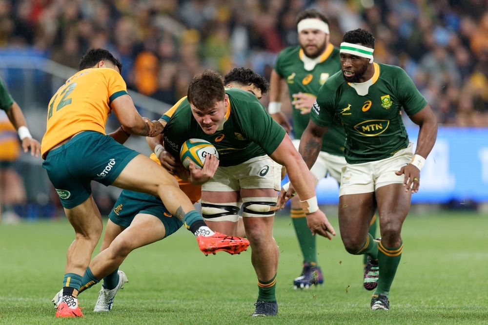 Jasper Wiese of South Africa is tackled by Hunter Paisami of Australia during The Rugby Championship match between the Australia Wallabies and South Africa